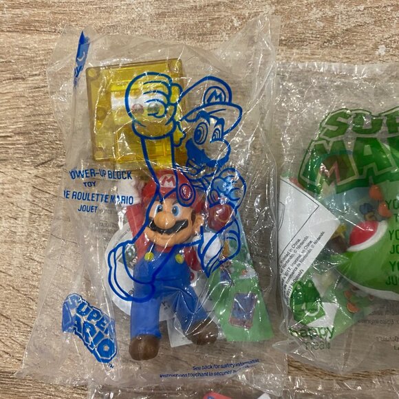 2017-2018 Lot Of (7) Unopened McDonalds Toys Super Mario, Yoshi, Justice League - Picture 2 of 7